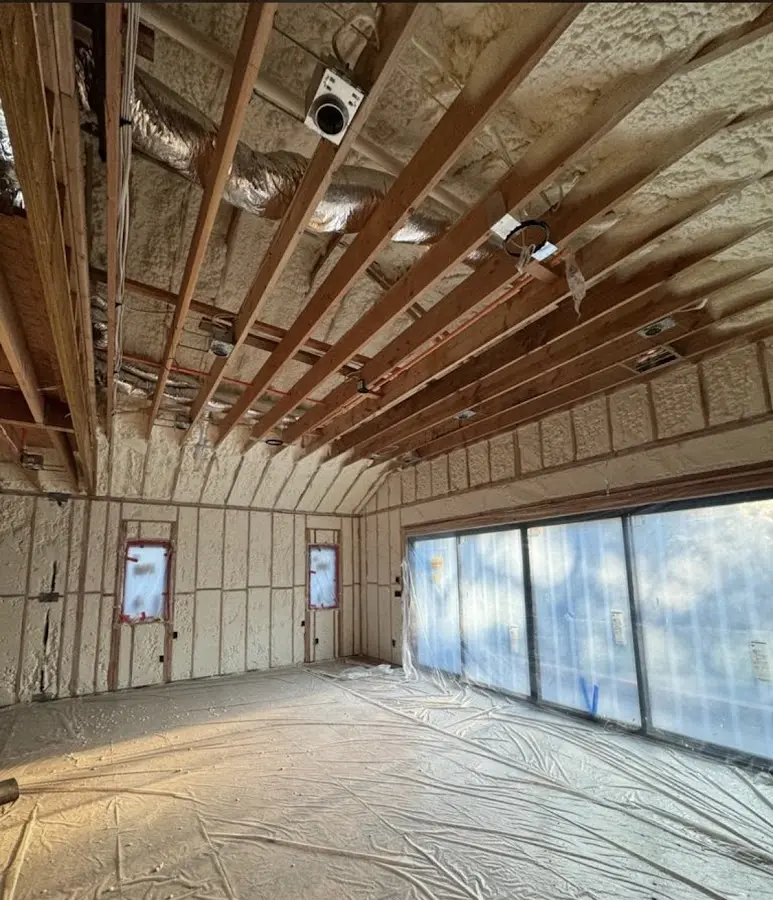 Interior walls and ceiling insulated with spray foam during new construction in Belle Fourche